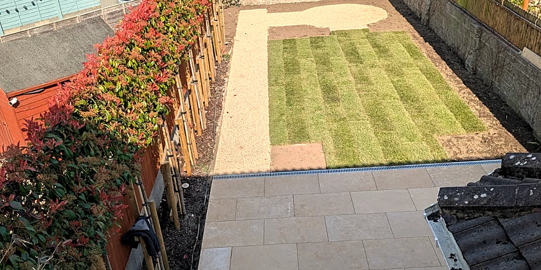 Egyptian limestone pathway beside a pleached hedge, Clonskeagh