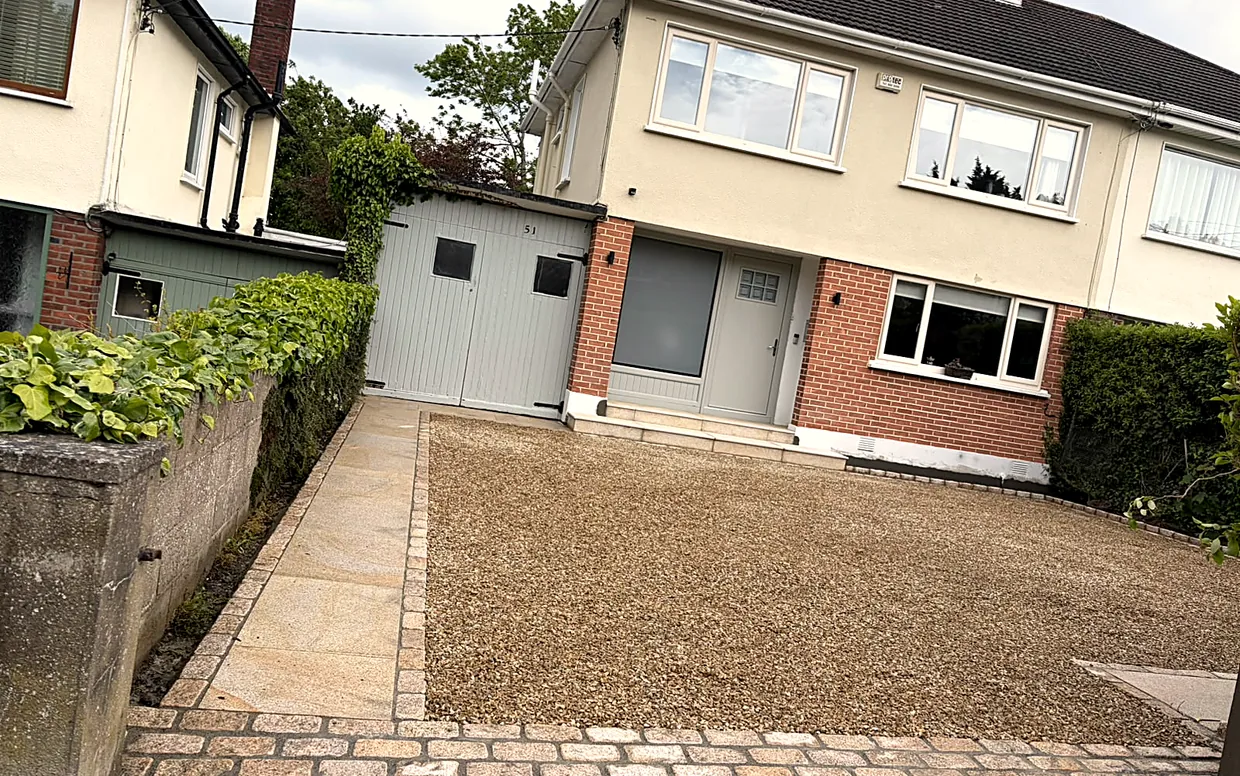 A finished gravel driveway held in place by a firm cobble edge, South Dublin.