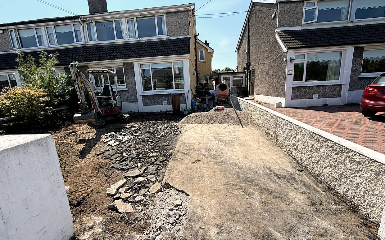Day one on the Rathfarnham driveway: the old surface lifted and the ground dug out to firm base.