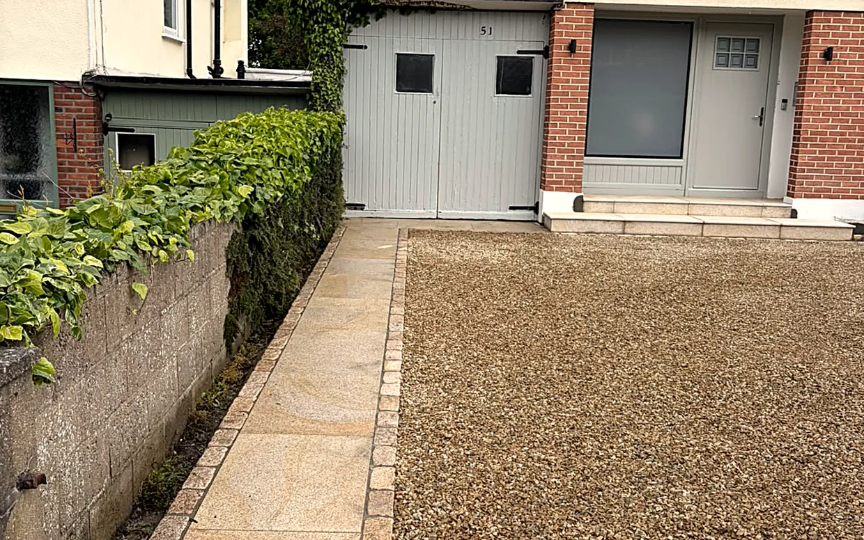 A gravel driveway, the cost-effective option that drains straight through.