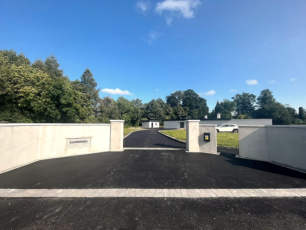 Tarmac driveway with walled entrance