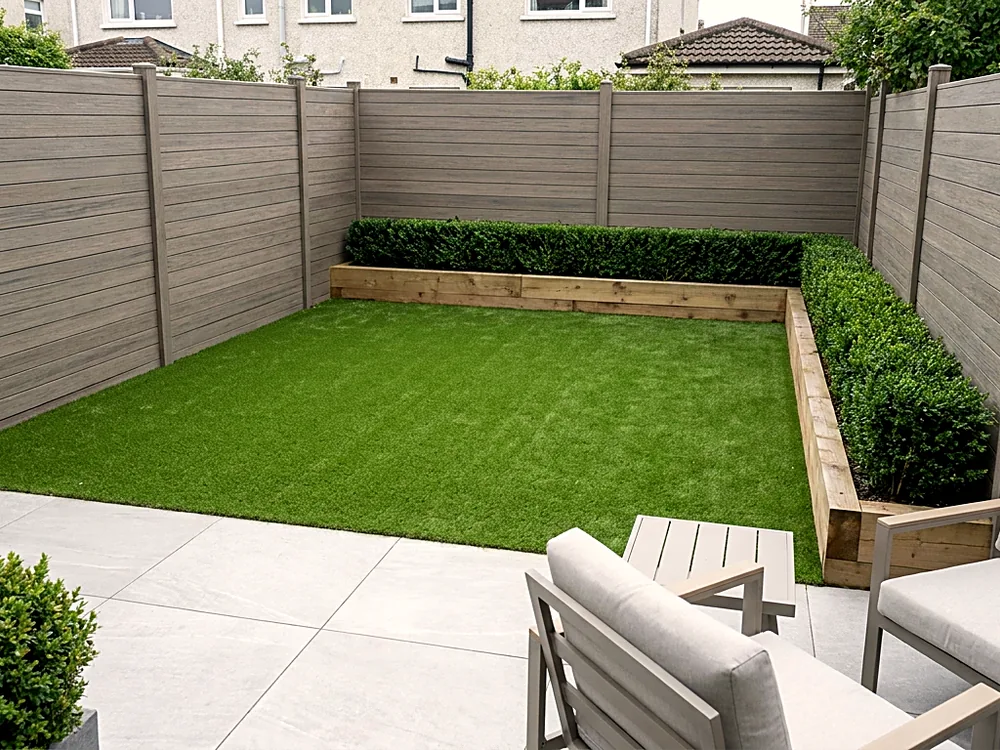Enclosed family garden with artificial grass