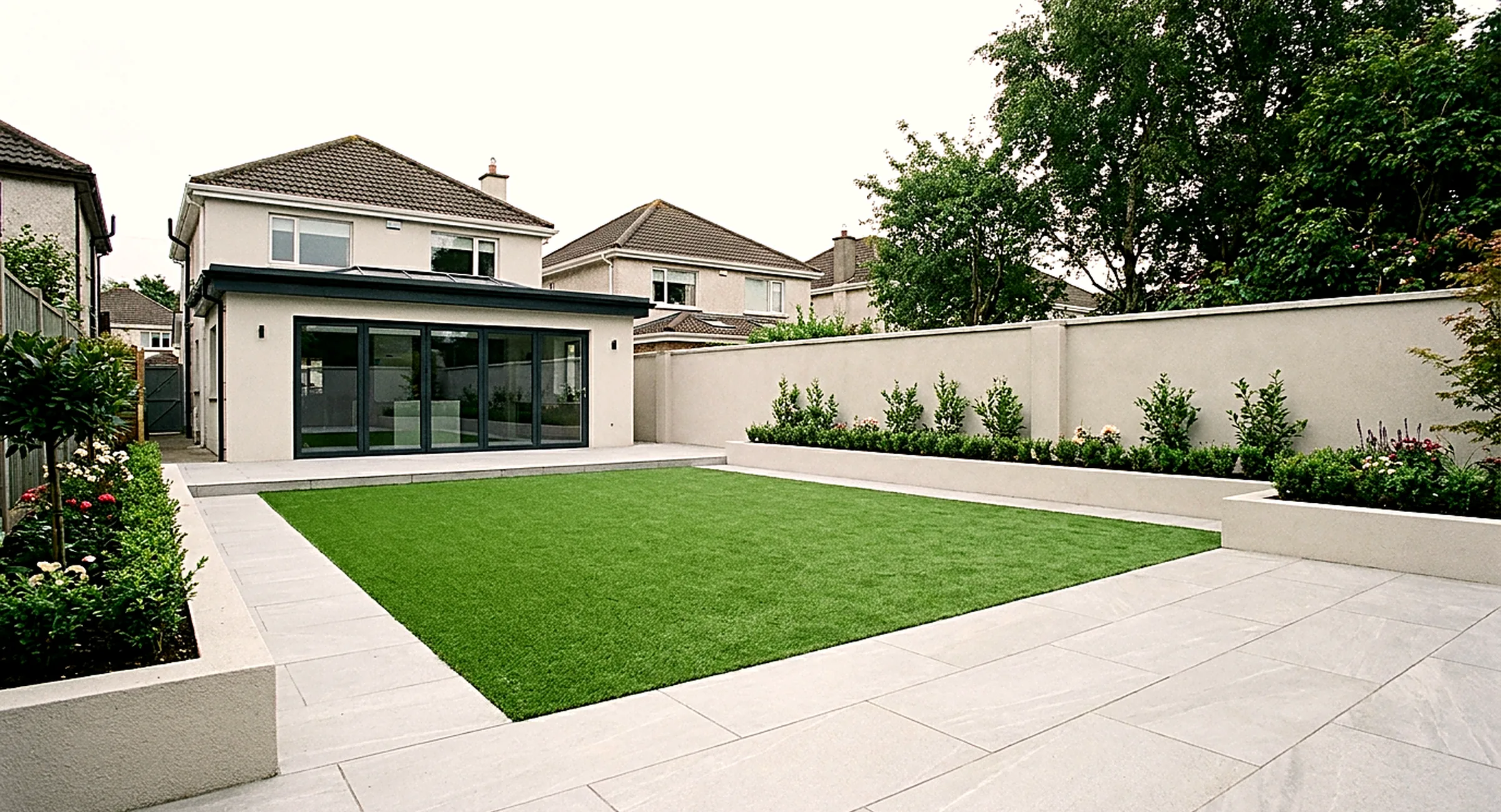 Artificial grass lawn with a porcelain border