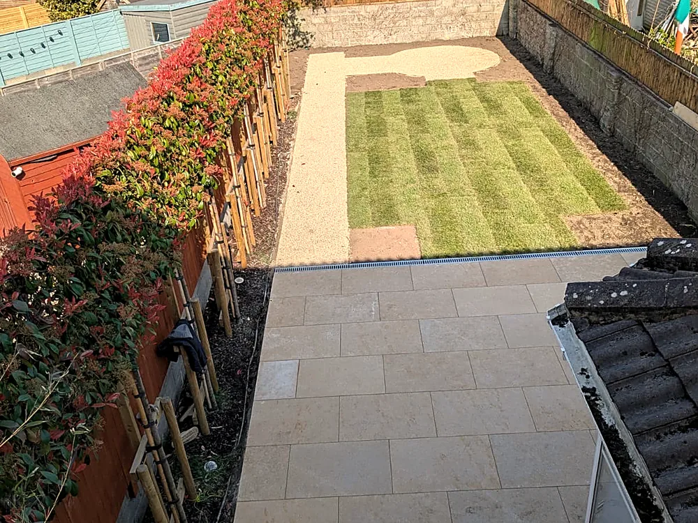 Stone paths framing a new lawn
