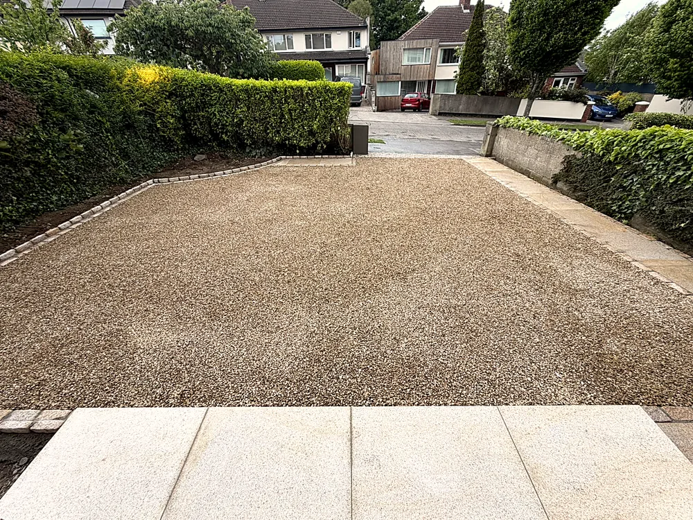 Golden gravel driveway with gates