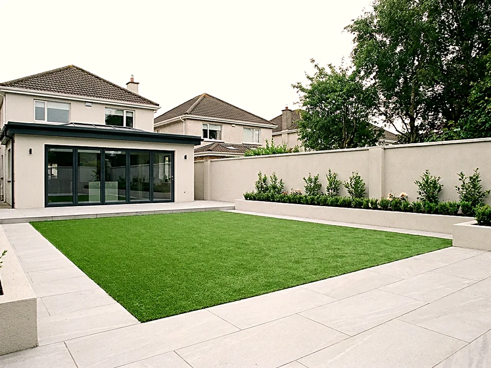 Artificial grass lawn with a porcelain border